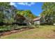 Charming one-story home with landscaped front yard and mature shade trees at 1318 Indian Camp Rd, Chapel Hill, NC 27516