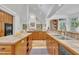 Spacious kitchen featuring wood cabinets, stainless steel appliances, and an open layout at 1318 Indian Camp Rd, Chapel Hill, NC 27516