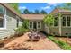 Private patio with brick pavers and outdoor seating, perfect for entertaining at 1318 Indian Camp Rd, Chapel Hill, NC 27516