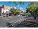 Vibrant street view with shops, mature trees, and street parking at 1318 Indian Camp Rd, Chapel Hill, NC 27516