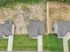 A gray house with a screened porch amongst lawns, shot from above at 138 Alden Way, Angier, NC 27501