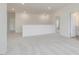 Spacious area with doorways offering access to bathroom and walk-in closet, enhanced by bright natural light at 138 Alden Way, Angier, NC 27501