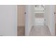 Bright hallway view showcases doorway to walk-in closet, bathroom and extra room, offering convenient access at 138 Alden Way, Angier, NC 27501