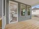 Cozy screened-in porch with backyard views and access to both the interior and the outdoor space at 138 Alden Way, Angier, NC 27501