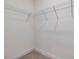 Spacious walk-in closet featuring wire shelving for optimal storage and organization at 138 Alden Way, Angier, NC 27501