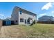Wide view of a large, fenced backyard featuring a garden shed and solar panels at 138 Horizon Trl, Garner, NC 27529