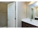 The bathroom has a mirror over the sink and a doorway at 138 Horizon Trl, Garner, NC 27529