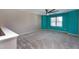 Neutral bedroom with ceiling fan and plenty of natural light from the window at 138 Horizon Trl, Garner, NC 27529