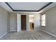 Neutral bedroom with carpet floors and multiple access doors to other rooms at 138 Horizon Trl, Garner, NC 27529