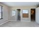 This carpeted bedroom has a mirror and doorway to another room at 138 Horizon Trl, Garner, NC 27529