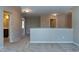 Open hallway with neutral colors and carpet leading to multiple rooms at 138 Horizon Trl, Garner, NC 27529