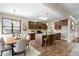 Modern kitchen with light countertops, brown cabinets, and stainless steel appliances at 138 Horizon Trl, Garner, NC 27529