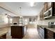 Open kitchen with granite countertops, stainless steel appliances, eat in kitchen, and natural light at 138 Horizon Trl, Garner, NC 27529