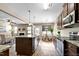 Open kitchen with granite countertops, stainless steel appliances, eat in kitchen, and natural light at 138 Horizon Trl, Garner, NC 27529