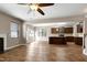 Open-concept floor plan showing living room and kitchen with hardwood floors at 138 Horizon Trl, Garner, NC 27529