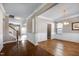 Spacious living room with hardwood floors, fireplace, natural light, and staircase at 138 Horizon Trl, Garner, NC 27529
