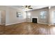 Bright living room featuring hardwood floors, a fireplace, and lots of natural light at 138 Horizon Trl, Garner, NC 27529