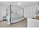 Primary bedroom featuring a decorative bed frame, neutral carpet and a view of the door and closet at 1501 Addison Lake St, Fuquay Varina, NC 27526