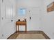 Bright entryway with a wooden desk, white walls, and stylish decor at 1501 Addison Lake St, Fuquay Varina, NC 27526