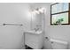 Bathroom featuring a modern vanity with storage and sleek fixtures at 158 Poplar St # A, Chapel Hill, NC 27516
