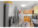 Kitchen with stainless steel appliances and wooden cabinets at 158 Poplar St # A, Chapel Hill, NC 27516