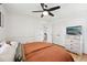 A charming bedroom with hardwood floors and neutral-colored walls for a comfortable aesthetic at 1636 Cone Ave, Apex, NC 27502