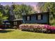 Charming two-story home with lush landscaping, brick accents and inviting curb appeal at 1636 Cone Ave, Apex, NC 27502