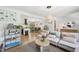 Open concept floor plan with living room that flows into the kitchen and dining area at 1636 Cone Ave, Apex, NC 27502