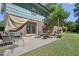 This home features a cozy outdoor patio with a dining set, perfect for entertaining guests at 1636 Cone Ave, Apex, NC 27502