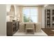 Stylish dining area with wood table, seating for six, modern lighting, and elegant decor at 1645 Goldfinch Perch Ln, Knightdale, NC 27545