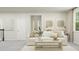 Inviting living room with sofa, decorative pillows, and art, creating a stylish space at 1645 Goldfinch Perch Ln, Knightdale, NC 27545