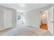Neutral bedroom with carpet flooring, a window, and a closet with paneled doors at 1715 Us 15-501 S, Chapel Hill, NC 27517