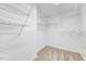 Organized walk-in closet with adjustable shelving for optimal storage at 1715 Us 15-501 S, Chapel Hill, NC 27517