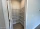 Spacious pantry with ample wire shelving, offering plenty of storage for food and kitchen essentials at 1737 Pecan Drive # 21, Nashville, NC 27856