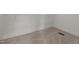 A carpeted walk-in closet featuring white wire shelving and neutral carpet at 2066 Lake Point Dr, Graham, NC 27253
