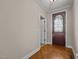 Inviting entryway with hardwood floors and an ornate front door at 2066 Lake Point Dr, Graham, NC 27253