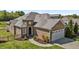 Charming single-Gathering home boasts brick exterior, two-car garage and landscaped yard at 2066 Lake Point Dr, Graham, NC 27253