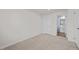 Neutral bedroom with a closet, an outlet, and an entrance to the en-suite bathroom at 209 Timber Forest Ln, Cary, NC 27519