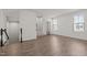 Second floor hallway with carpeted floors, neutral walls, and natural lighting at 209 Timber Forest Ln, Cary, NC 27519