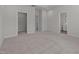 Spacious main bedroom has neutral walls, carpet, and ensuite bathroom access at 209 Timber Forest Ln, Cary, NC 27519