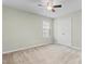 Light and airy bedroom with a ceiling fan and a large window at 2103 Glenkirk Dr, Burlington, NC 27215