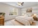 Bright bedroom with large window, neutral walls, and a cozy, inviting bed at 2103 Glenkirk Dr, Burlington, NC 27215