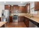 Updated kitchen features stainless steel appliances and granite countertops at 2103 Glenkirk Dr, Burlington, NC 27215