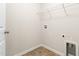 Functional laundry room with tile flooring and hookups ready for appliances at 2103 Glenkirk Dr, Burlington, NC 27215