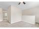 Upstairs loft with neutral carpet and access to a carpeted bedroom at 2103 Glenkirk Dr, Burlington, NC 27215
