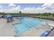 Large community swimming pool with ample seating, perfect for relaxation and recreation at 2103 Glenkirk Dr, Burlington, NC 27215