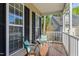 Inviting front porch with seating, offering a cozy outdoor space for relaxing and enjoying the neighborhood view at 213 Meadow Fox Rd, Holly Springs, NC 27540