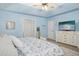 Comfortable main bedroom with a ceiling fan, neutral tones, and carpeted floors at 213 Meadow Fox Rd, Holly Springs, NC 27540