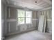 Bedroom with a window, drywall and trim at 2305 Ballywater Lea Way, Wake Forest, NC 27587