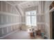 Bedroom featuring a large window and drywall at 2305 Ballywater Lea Way, Wake Forest, NC 27587